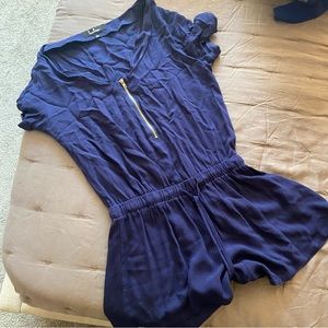 Lulus short sleeve romper with gold zipper. Size small.